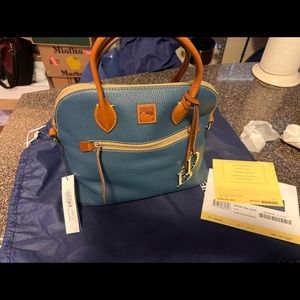 Dooney and Bourke Pebble Leather Large Domed Satchel in the color Jeans. NWT!